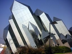 Sharp Glass Futuristic Building in futuroscope, theme park based upon multimedia, france, poitiers