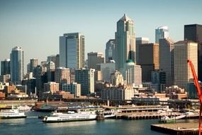 ships in harbor at modern city, usa, washington, seattle