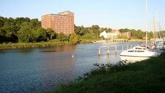 summer landscape with sailing boats at riverside, germany, kiel