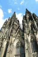 towers of gothic cathedral at sky, germany, cologne