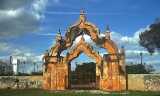 aged Double arch gate of plantation, mexico, Yaxcopoil