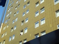 rows of paired windows on modern facade