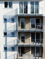 shadow play on facade with balconies