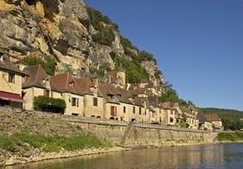 waterfront with old houses in line at cliff, france