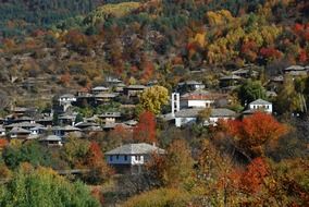 old town on mountain side at autumn, bulgaria, kovachevitza