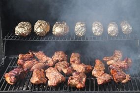 barbecue smoking on grill, usa, oklahoma, midwest city