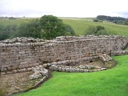 ruined wall of vindolanda, ancient Roman auxiliary fort, at summer, uk, england