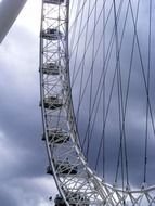 london eye ferris wheel, detail at clouds, uk, england