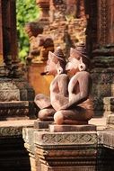 Side view of sculptures in the temple of Banteay Srei