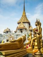 aged golden buddha statues at temple, thailand, Bangkok