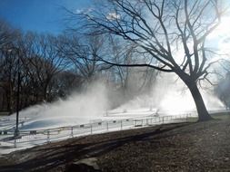 snow-making equipment at work in central park, usa, new york city