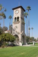 Beale Memorial Clock Tower among palm trees, usa, california bakersfield