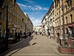 pedestrian street with cobblestone pavement in old city, russia, st petersburg