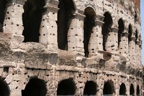 close up of ancient colosseum wall, italy, rome