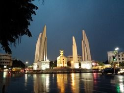 Democracy Monument in city at night, thailand, bangkok