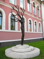 female body with tree branches at top, modern sculpture, germany, oldenburg