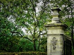 old column at gate of park, netherlands, valkenburg