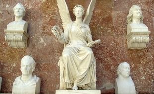 bust group around sculpture of angel at wall of Walhalla main hall, germany, bavaria