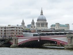 view of st paul’s dome from thames river, uk, england, london