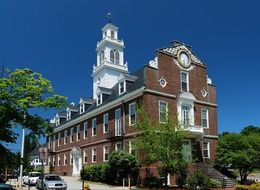 town hall with clock and bell tower at summer, usa, massachusetts, weymouth