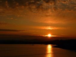 red sunset above pacific ocean, canada, british columbia, vancouver island