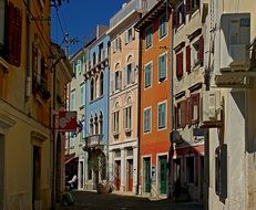 colored plaster on the facades of houses in the old town
