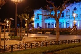 park in front of city hall at night, spain, san sebastián