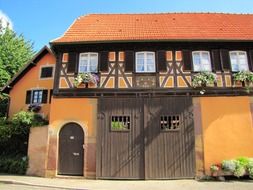 picturesque old village house with gate