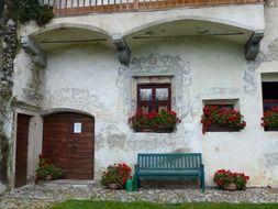 flowers decorated old house, italy