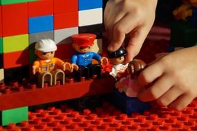 child plays lego duplo