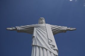 christ the redeemer statue at blue sky, brazil, taubatÃ©