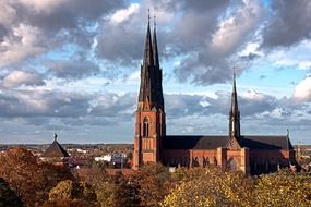 medieval cathedral in old city at fall, sweden, uppsala