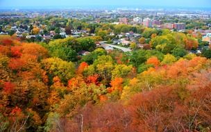 distant town in scenic colorful autumn landscape