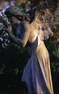 stone angel, sculpture on cemetery, poland, warsaw