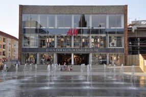 fountain in front of house of culture and education, germany, neubrandenburg