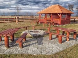 picnic spot with fire pit in rest area at fall, hungary