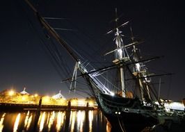 uss constitution, old wooden-hulled, three-masted heavy frigate on water at night city, usa, boston, massachusetts