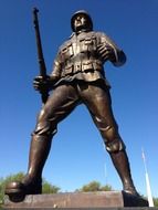 soldier in helmet, bronze sculpture in war memorial, usa