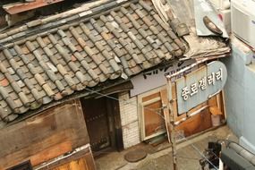 weathered tile roof of old building, korea, seoul