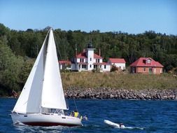 sailboat on lake at village, usa, wisconsin