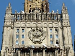 soviet state emblem on facade of ministry of foreign affairs building, russia, moscow