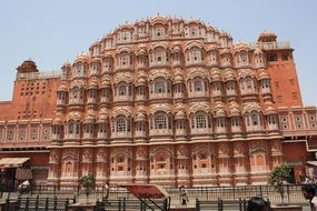 aged red and pink sandstone palace of winds, india, rajasthan, jaipur