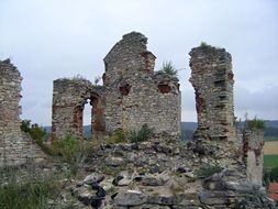 aged stone ruins on hill