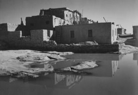 old houses with ladders on flooded street, usa,new mexico