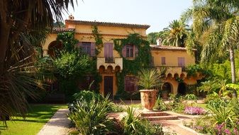 garden in front of old mediterranean villa