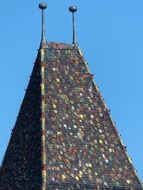 colorful brick roof against blue sky