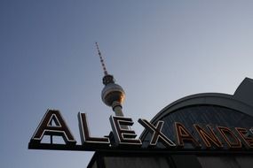 alexanderplatz letterung and tv tower at sky, germany, berlin