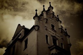 hotel viktualienmarkt, top of medieval building at clouds, germany, munich