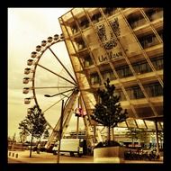 ferris wheel in harbour, old time view, germany, hamburg