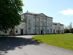 cams hall, palladian mansion in park at summer, uk, hampshire